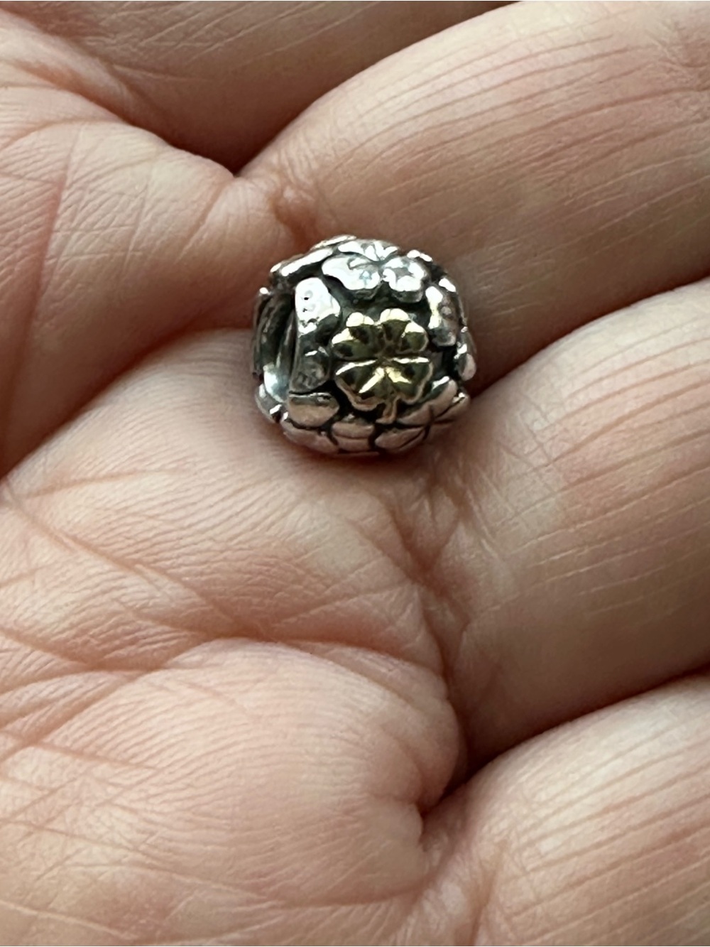 Pandora’s Lucky Clover charm.  Two-Tone Floral in Silver and Gold
